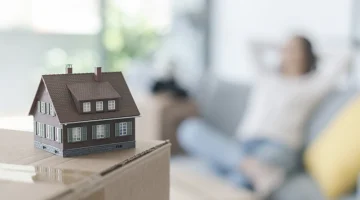happy-woman-moving-in-her-new-home
