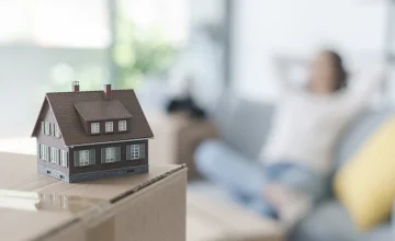 happy-woman-moving-in-her-new-home
