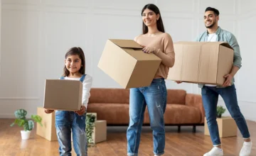 happy-young-arab-family-carrying-boxes-in-new-flat happy-young-arab-family-carrying-boxes-in-new-flat
